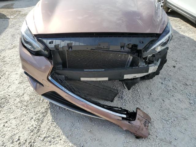 SJKCH5CP7JA059650 - 2018 INFINITI QX30 BASE TAN photo 9