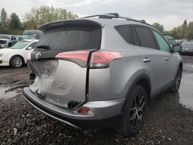 2T3JFREV3HW675702 - 2017 TOYOTA RAV4 SE SILVER photo 4