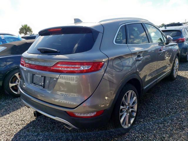 5LMCJ3C90HUL57861 - 2017 LINCOLN MKC RESERV GRAY photo 4