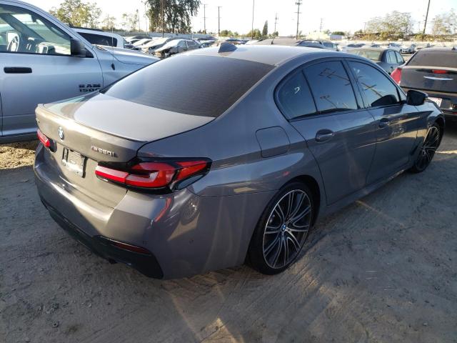 WBA13BK09MCF93639 - 2021 BMW M550XI GRAY photo 4