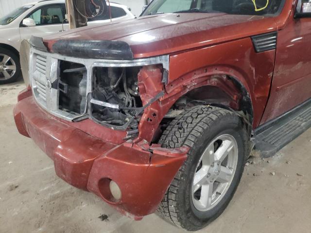 1D8GU58K67W550396 - 2007 DODGE NITRO SLT ORANGE photo 9