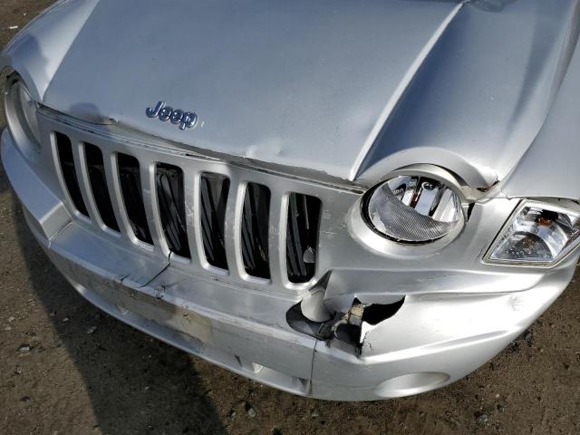 1J4NF4FB8AD524912 - 2010 JEEP COMPASS SP SILVER photo 9