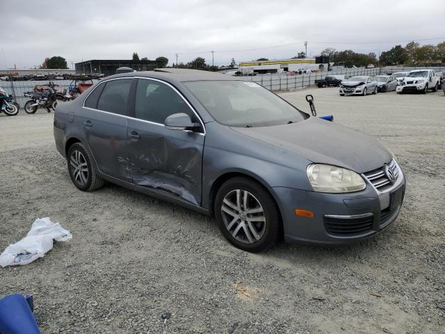 3VWSG71KX5M611281 - 2005 VOLKSWAGEN NEW JETTA GRAY photo 1