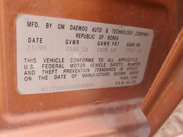 KL1TD56656B580974 - 2006 CHEVROLET AVEO BASE ORANGE photo 10