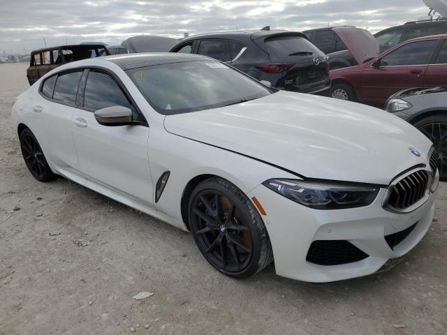 WBAGV8C09NCK17771 - 2022 BMW M850XI WHITE photo 4