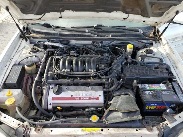 JN1CA31D4YT756599 - 2000 NISSAN MAXIMA GLE WHITE photo 7