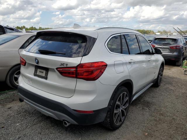 WBXHT3C35J5K24065 - 2018 BMW X1 XDRIVE2 WHITE photo 4