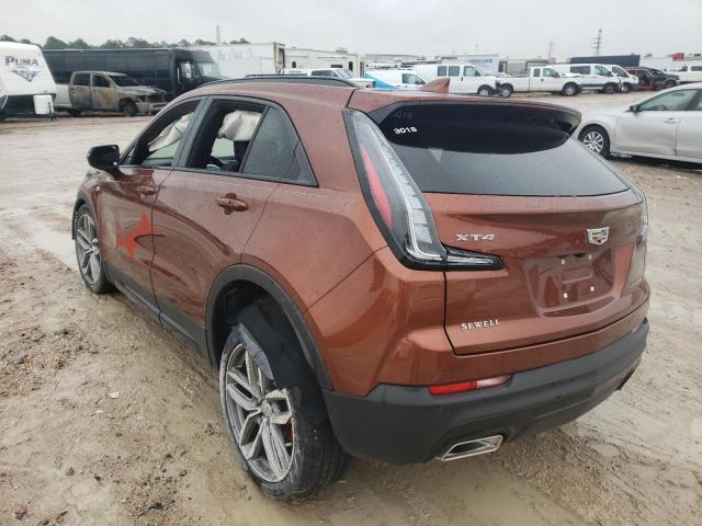 1GYFZER43MF080071 - 2021 CADILLAC XT4 SPORT ORANGE photo 3