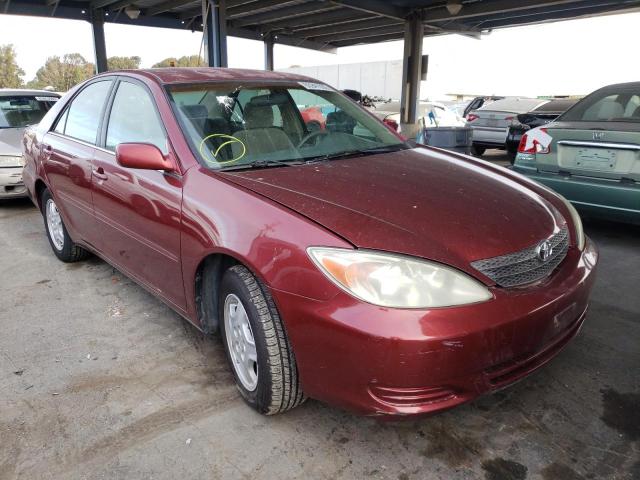 4T1BF30K73U046783 - 2003 TOYOTA CAMRY LE RED photo 1