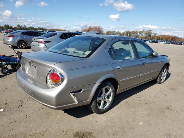 JN1CA31A41T113732 - 2001 NISSAN MAXIMA GXE BEIGE photo 4