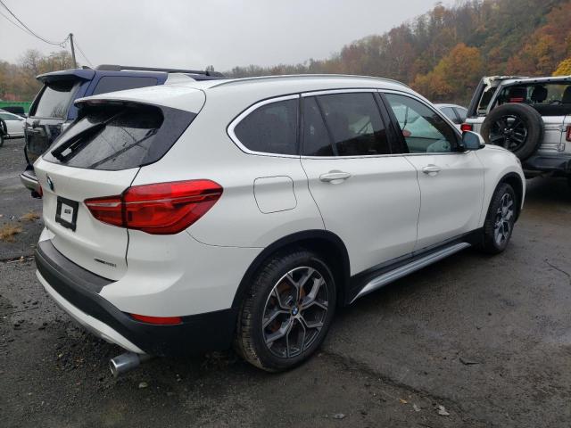 WBXJG9C00L5P45986 - 2020 BMW X1 XDRIVE2 WHITE photo 4