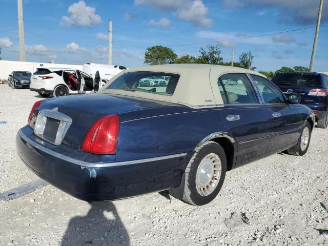 1LNHM81W12Y631011 - 2002 LINCOLN TOWN CAR BLUE photo 4