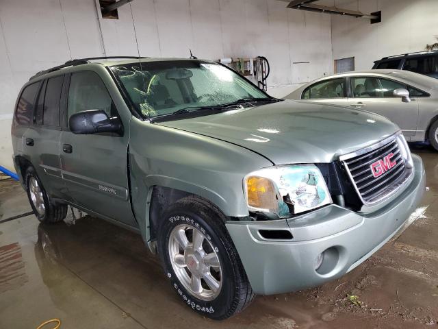 1GKDT13S542177766 - 2004 GMC ENVOY GREEN photo 1