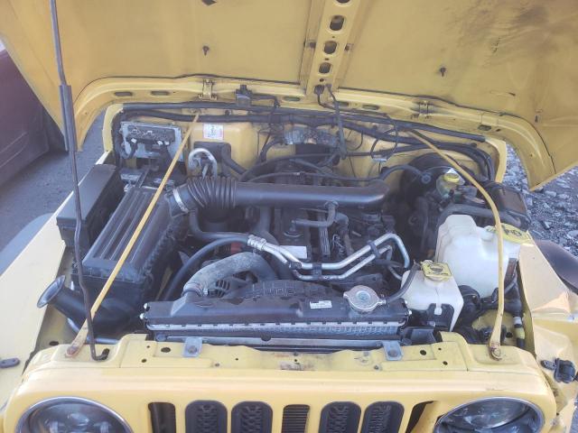 1J4FA49S0YP749560 - 2000 JEEP WRANGLER YELLOW photo 7