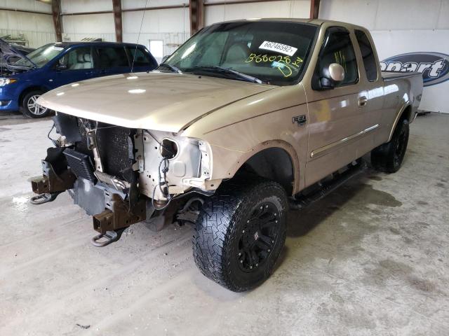 1FTRX18L8XKB88028 - 1999 FORD F150 TAN photo 2