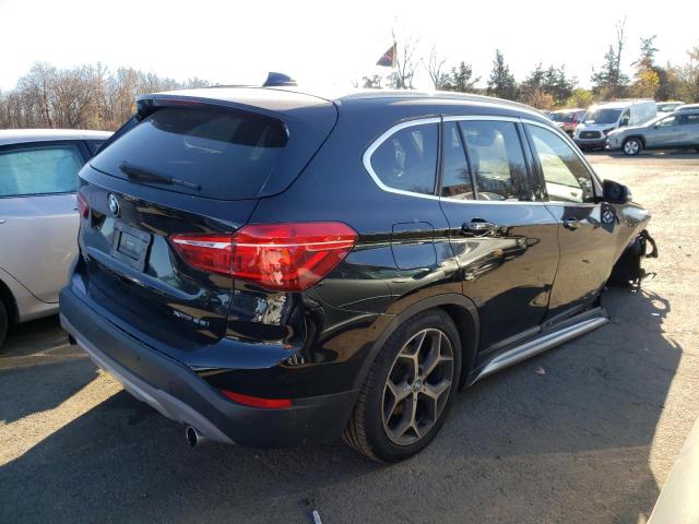 WBXHT3C50K3H36785 - 2019 BMW X1 XDRIVE2 BLACK photo 4