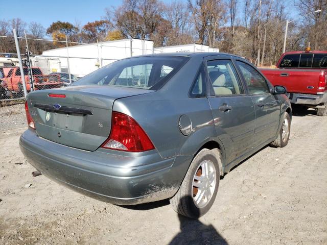 1FAFP34ZX3W285295 - 2003 FORD FOCUS SE C GREEN photo 4