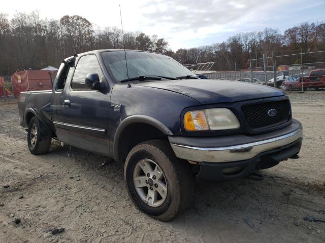 1FTRX18L32NB02535 - 2002 FORD F150 BLUE photo 1