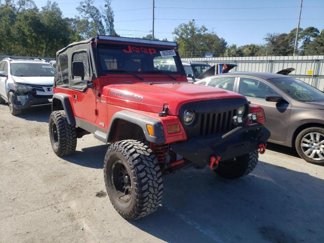 1J4FY29P3VP409102 - 1997 JEEP WRANGLER RED photo 1