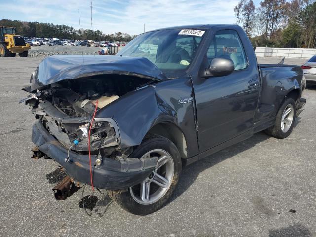 2FTRF07383CA35016 - 2003 FORD F150 SVT L BLACK photo 1