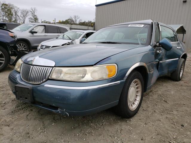 1LNHM81W41Y630319 - 2001 LINCOLN TOWN CAR E TEAL photo 2