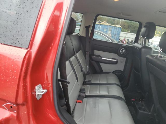 1D4PT7GX9AW163491 - 2010 DODGE NITRO SHOC RED photo 6