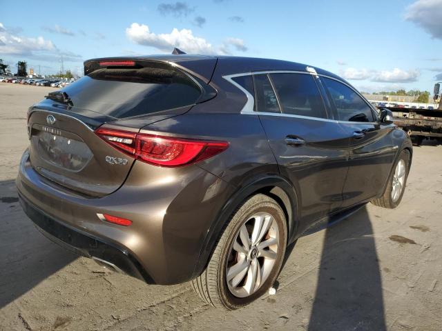 SJKCH5CP8HA031365 - 2017 INFINITI QX30 BASE BROWN photo 4