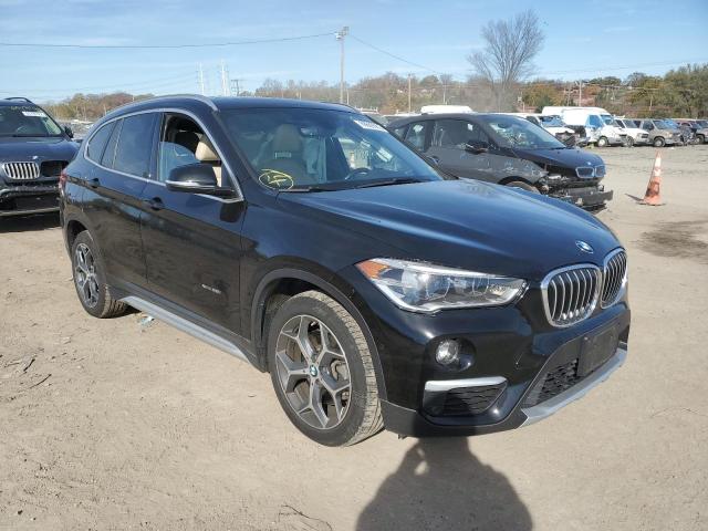 WBXHT3C39GP884994 - 2016 BMW X1 XDRIVE2 BLACK photo 1