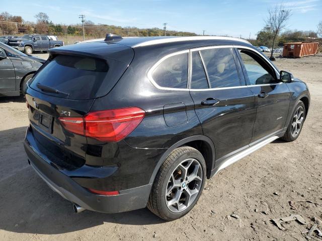 WBXHT3C39GP884994 - 2016 BMW X1 XDRIVE2 BLACK photo 4