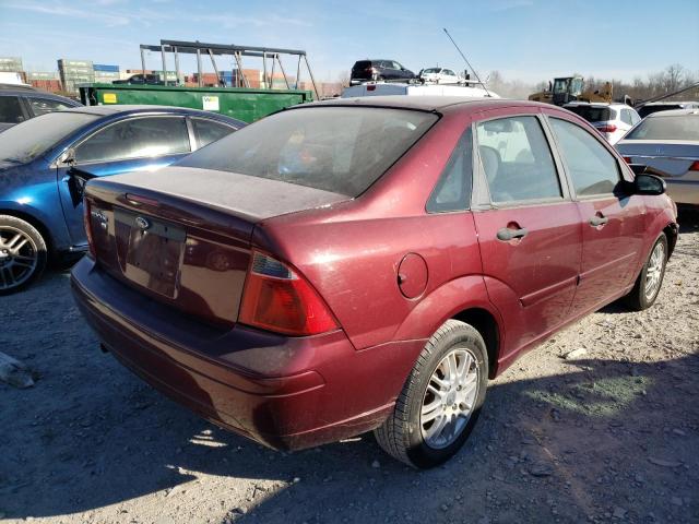 1FAFP34N37W301243 - 2007 FORD FOCUS ZX4 MAROON photo 4