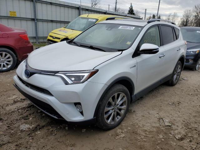 JTMDJREV9JD240729 - 2018 TOYOTA RAV4 HV LI WHITE photo 2