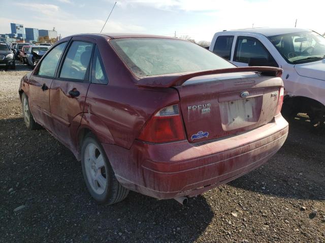 1FAFP34N65W165381 - 2005 FORD FOCUS RED photo 3