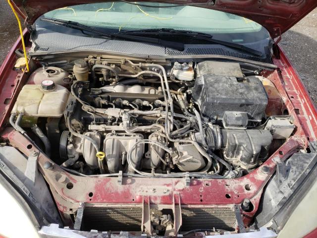 1FAFP34N65W165381 - 2005 FORD FOCUS RED photo 7