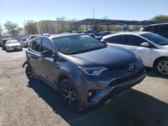 JTMJJREV3HD081347 - 2017 TOYOTA RAV4 HV SE GRAY photo 1