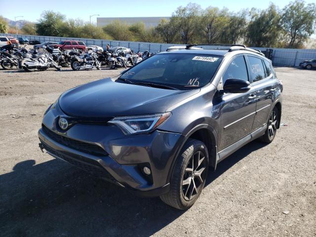 JTMJJREV3HD081347 - 2017 TOYOTA RAV4 HV SE GRAY photo 2