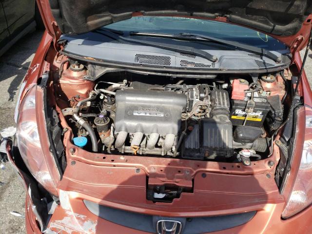 JHMGD38677S001978 - 2007 HONDA FIT S ORANGE photo 7