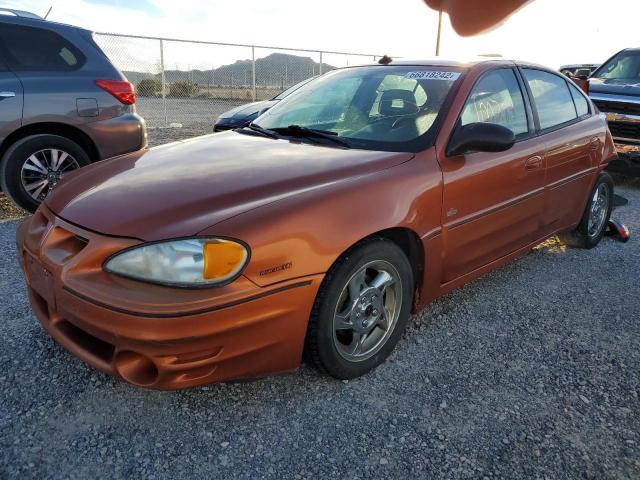 1G2NV52E13C307083 - 2003 PONTIAC GRAND AM G ORANGE photo 2