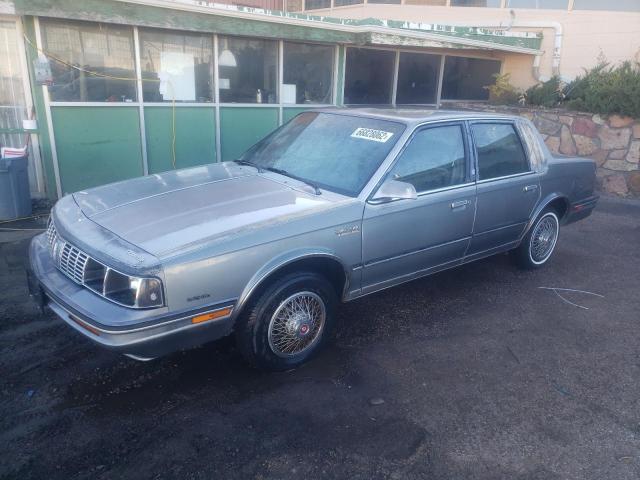 1G3AM19R6GD311922 - 1986 OLDSMOBILE CUTLASS CI GRAY photo 1