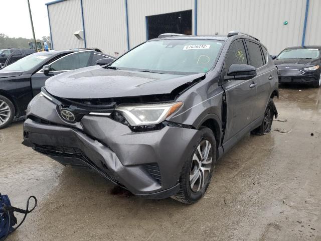 2T3ZFREV4HW354058 - 2017 TOYOTA RAV4 LE GRAY photo 2