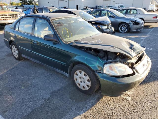 2HGEJ6610XH572392 - 1999 HONDA CIVIC BASE GREEN photo 4