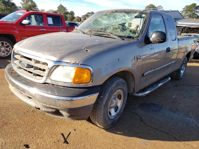 2FTRX17W44CA84325 - 2004 FORD F-150 HERI TAN photo 2