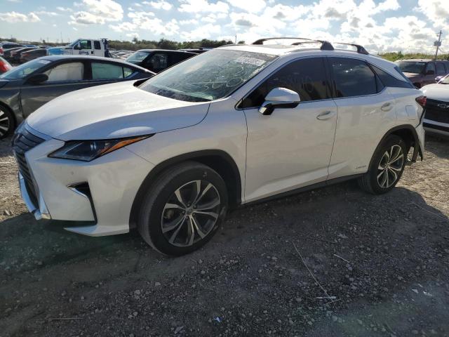 2T2BGMCA7GC006017 - 2016 LEXUS RX 450H BA WHITE photo 1