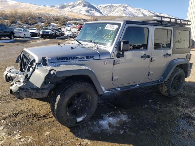 1C4BJWDG3GL121551 - 2016 JEEP WRANGLER U Silber Foto 1