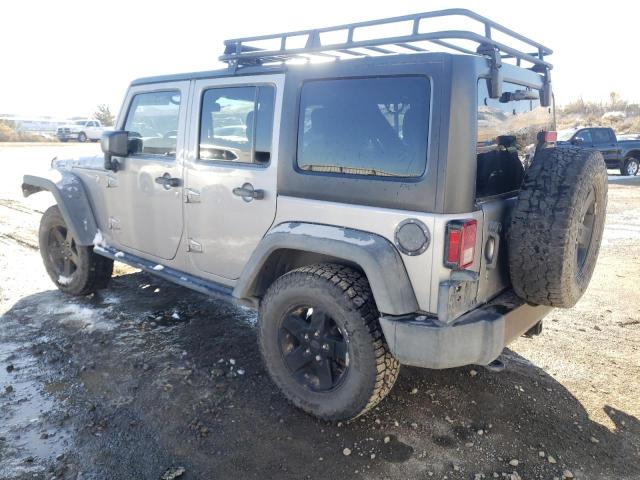 1C4BJWDG3GL121551 - 2016 JEEP WRANGLER U Silber Foto 2