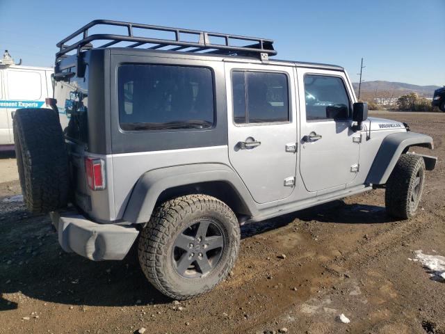 1C4BJWDG3GL121551 - 2016 JEEP WRANGLER U Silber Foto 3
