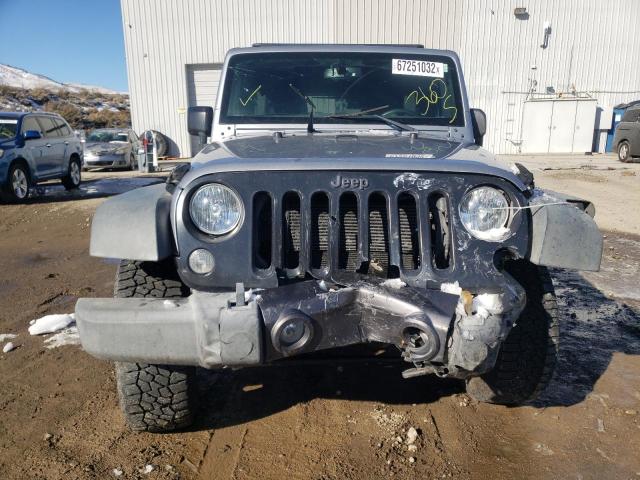 1C4BJWDG3GL121551 - 2016 JEEP WRANGLER U Silber Foto 5