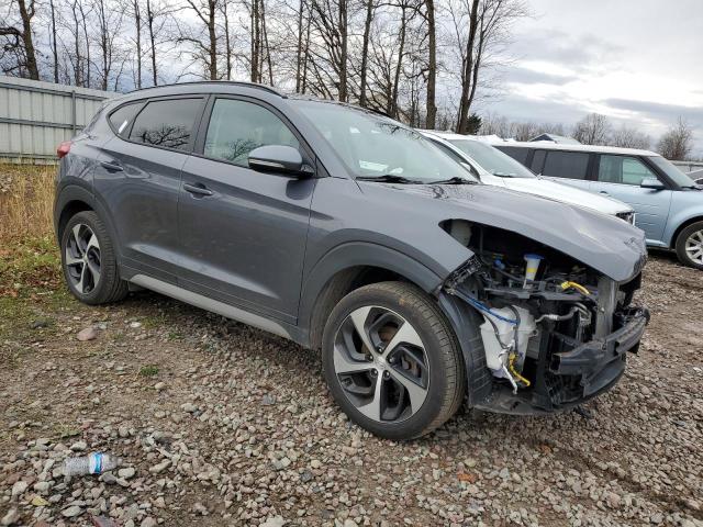 KM8J3CA27JU834186 - 2018 HYUNDAI TUCSON VAL BLUE photo 4