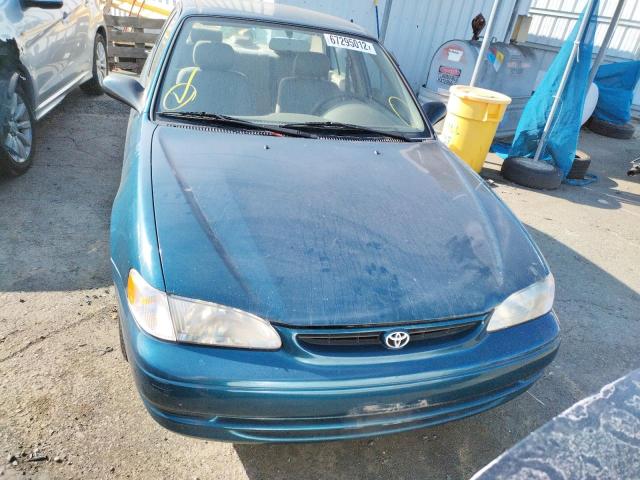 1NXBR12E6XZ183738 - 1999 TOYOTA COROLLA VE BLUE photo 5