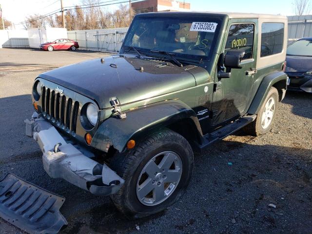 1J4GA5D11AL101439 - 2010 JEEP WRANGLER S GREEN photo 1