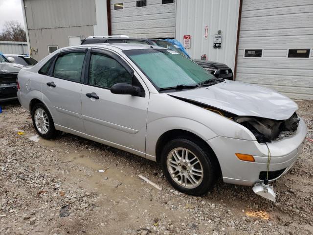 1FAFP34N37W299851 - 2007 FORD FOCUS ZX4 SILVER photo 4